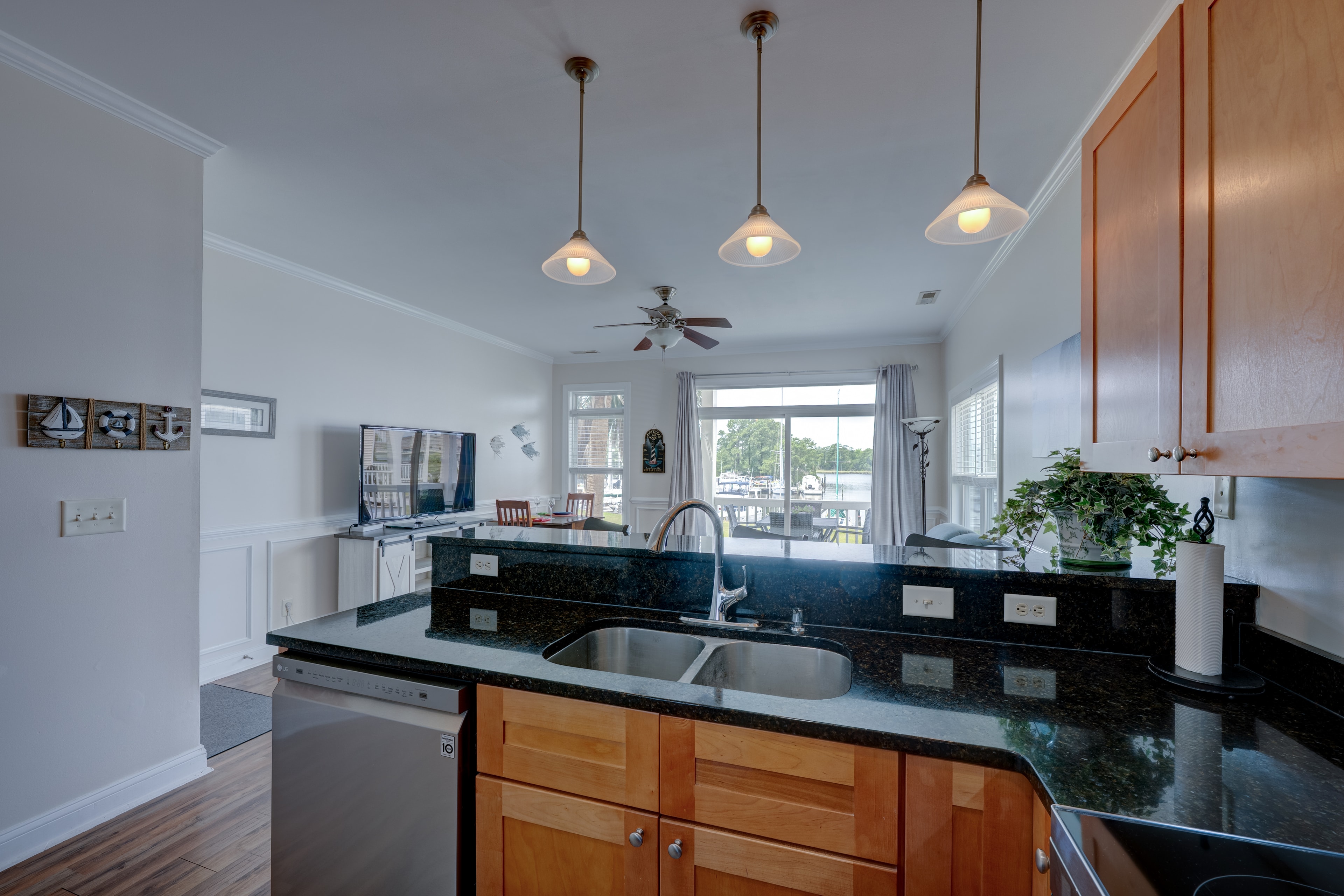 Updated kitchen with granite countertops and marina view